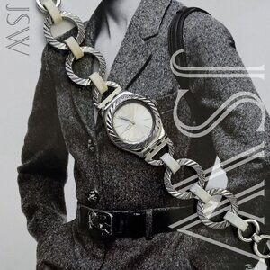 Ladies Swatch Swiss Irony Stainless Steel AG 2006 Turning Fool Quartz Watch YSS2